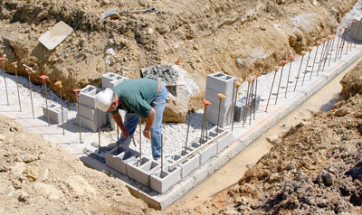 May 18, 2009 - Starting to lay foundation block.