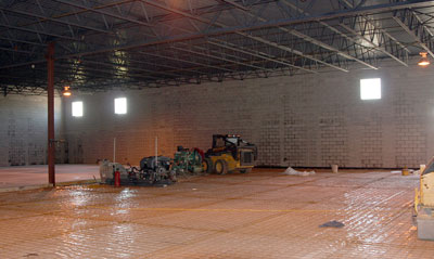 July 9, 2009 - The first half of the floor slab is being poured today.