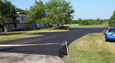 August 11, 2009 - The parking lot needs to sit for a few days before we can use it.